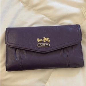 Purple coach wallet (PEN MARKS)